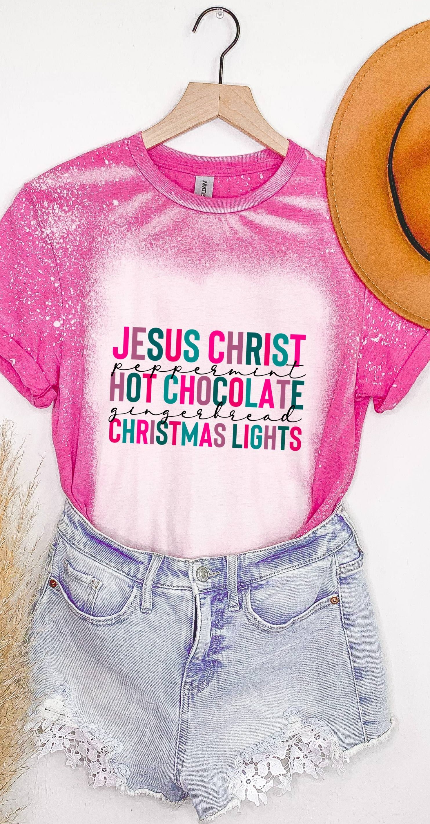Looking for a trending christian Christmas shirt? This cute "Jesus Christ, Hot Chocolate and Christmas Lights" shirt will add color to the new Christmas season. You have several style off shirts to choose from just note that each style and color is subject to change.