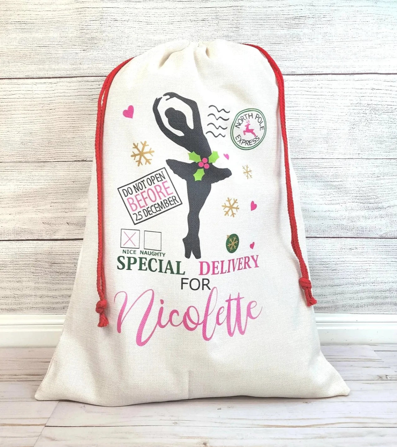 Giant santa toy sack with an image of a ballerina that is customizable with child's name.