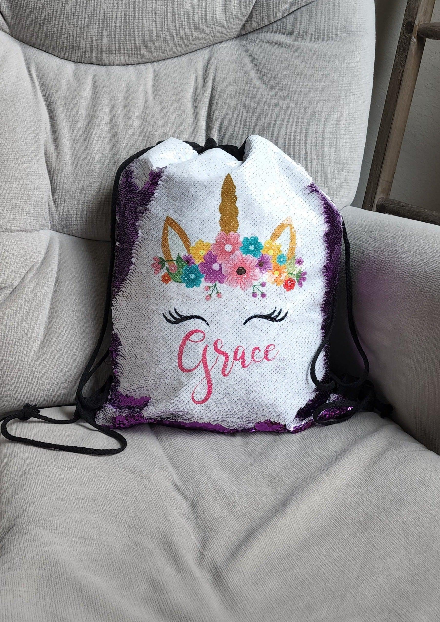 www.rejoiceincreation.com This personalized Unicorn bag makes a great gift for any girl who loves Unicorns. It can be used for the baby, toddler or child's everyday needs to include hold bottles, diapers, wipes, small toys, small tablet, journal, library books etc. It is also useful to hold extra pair of clothes, water bottle and snacks for gymnastics, ballet or dance practice.
